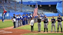 The Penn State baseball team participates in a pregame flag ceremony with Cuba's Industriales before competing in the Latin American Stadium in Havana, Cuba on Monday, Nov. 23, 2015. The Industrials beat Penn State 2-1. Photo by Kelsie Netzer