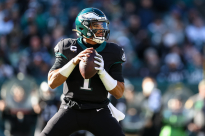 PHILADELPHIA, PA - DECEMBER 26: Jalen Hurts #1 of the Philadelphia Eagles looks to pass against the New York Giants during the first half at Lincoln Financial Field on December 26, 2021 in Philadelphia, Pennsylvania. (Photo by Scott Taetsch/Getty Images) No licensing by any casino, sportsbook, and/or fantasy sports organization for any purpose. During game play, no use of images within play-by-play, statistical account or depiction of a game (e.g., limited to use of fewer than 10 images during the game).
