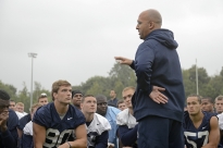 Penn State coach James Franklin talks to his team after its Wednesday evening practice at University College Dublin, Aug. 27, 2014.