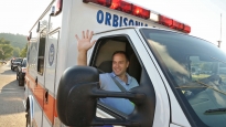 Pennsylvania State Representative Mike Fleck takes part in the Orbisonia- Rockhill Homecoming Parade on August 13, 2014.